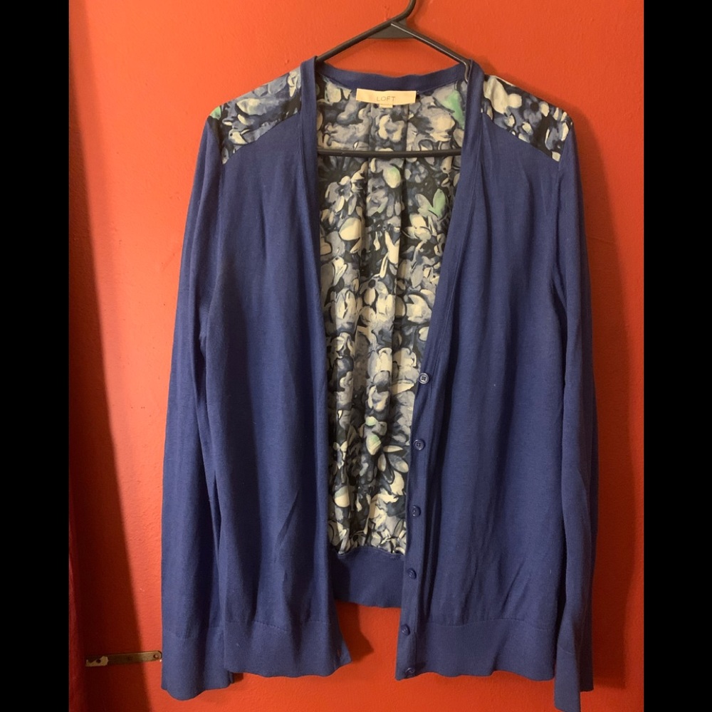 Loft royal blue sweater with flowers on the back.